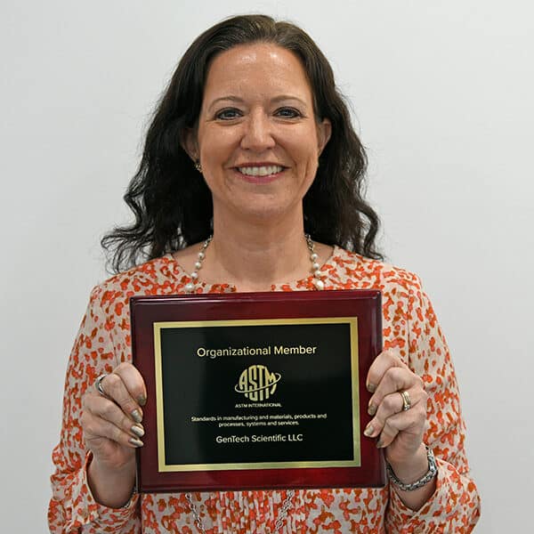yvette-with-ASTM-member-plaque_600x700