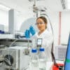 Image of a scientist operating a mass spectrometer